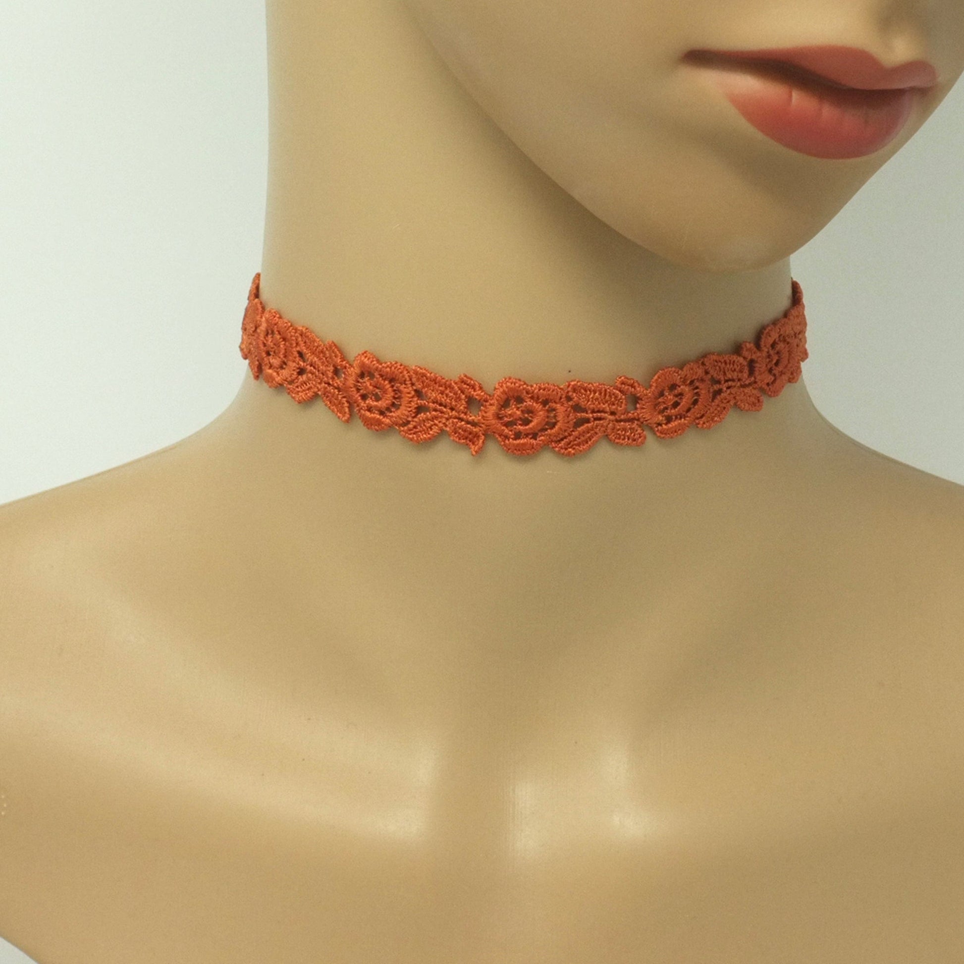 half inch rose lace choker in burnt orange