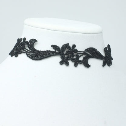 Side view of a lace flower necklace