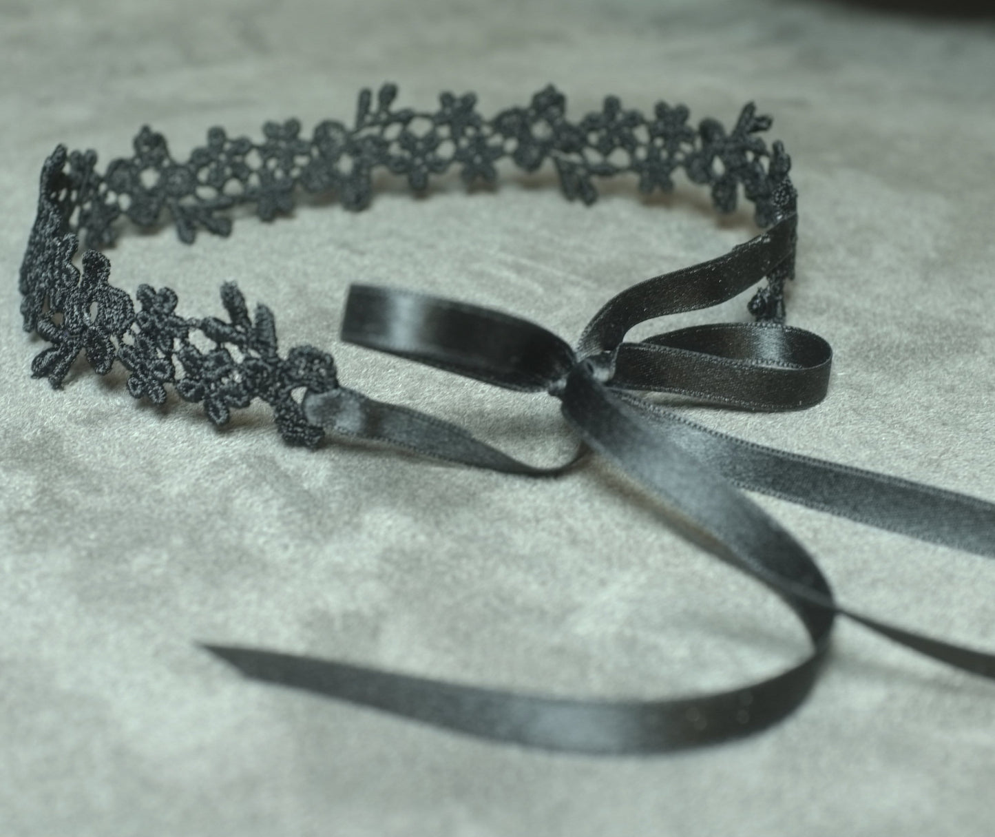 black choker with black silk ribbon