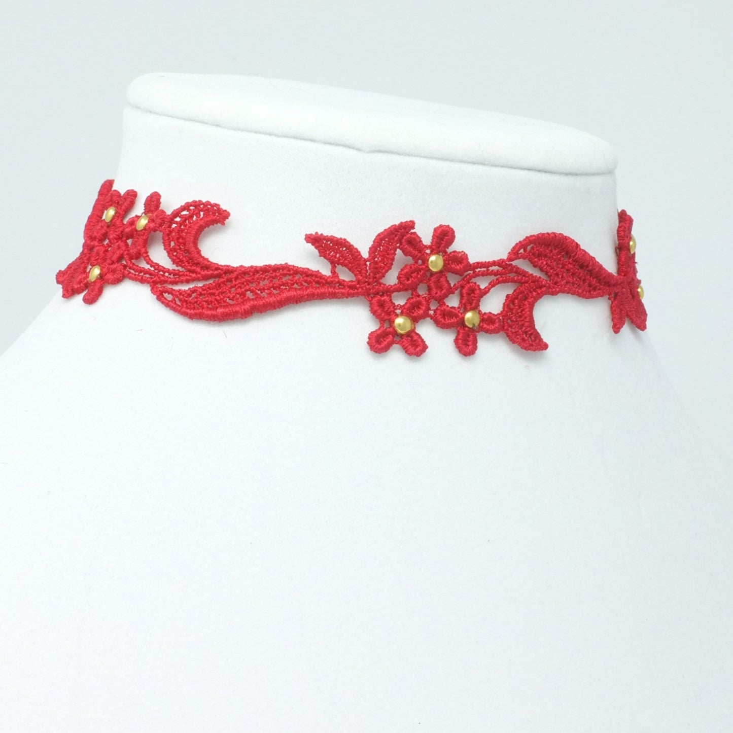 Machine-embroidered red lace choker with goldaccents, adjustable size, bold feminine necklace