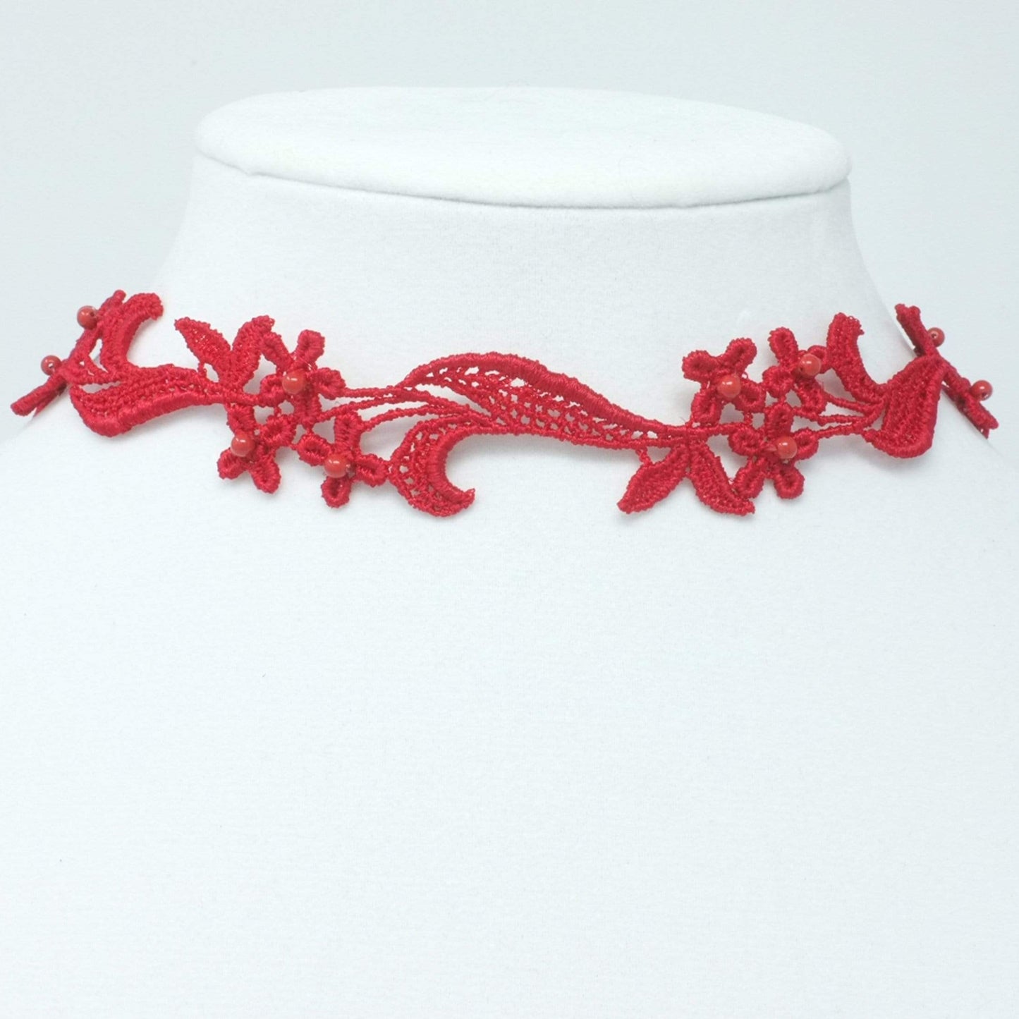 Red Lace Choker with a floral design and adorned with red  pearls