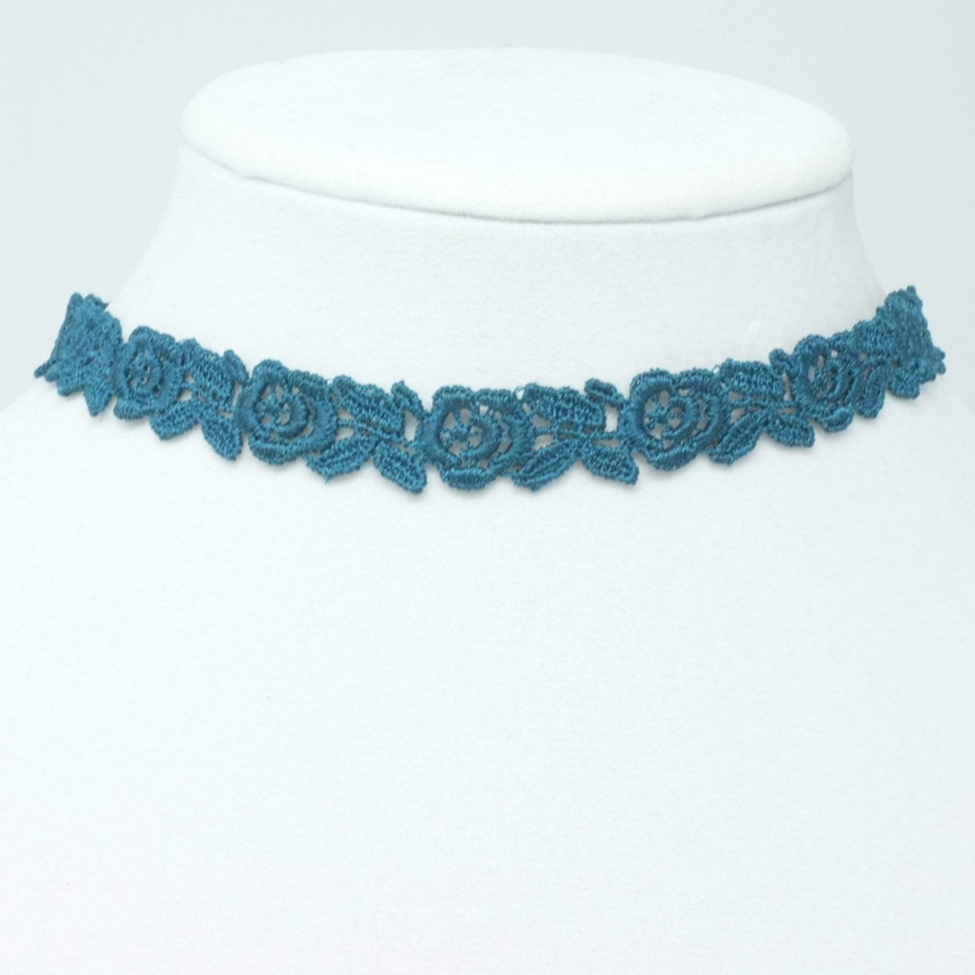 Lace choker necklace with teal rose pattern.