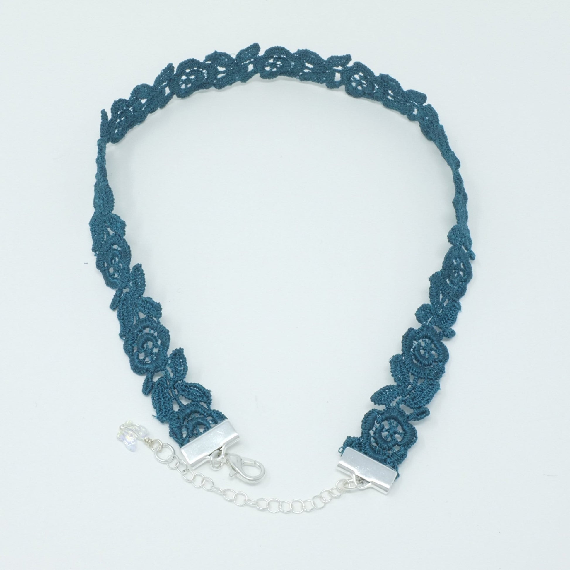 Blue-green rose choker with metal clasp closure